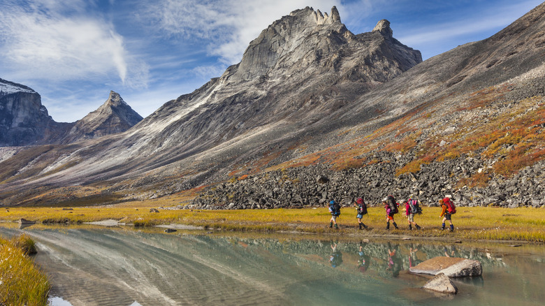 Backpackers exploring Gates of the Arctic National Park in Alaska