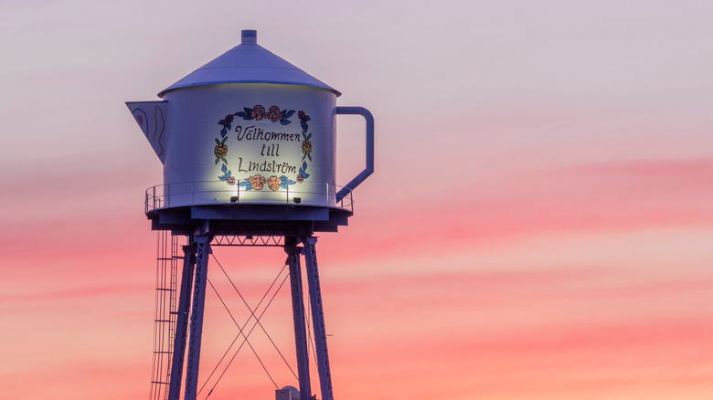 Lindström, Minnesota's giant coffee pot with a sunset behind it