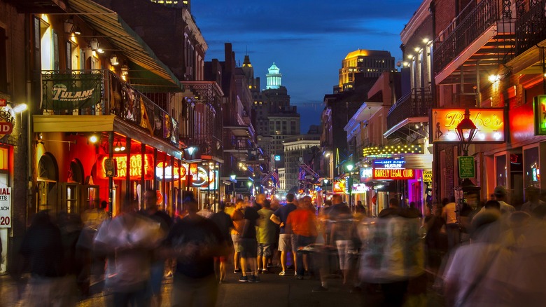 Crowds on night out in Bourbon Street New Orleans