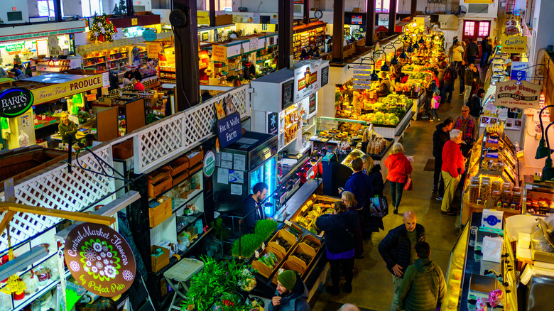 Interior of Lancaster Central market with stands customers and vendors