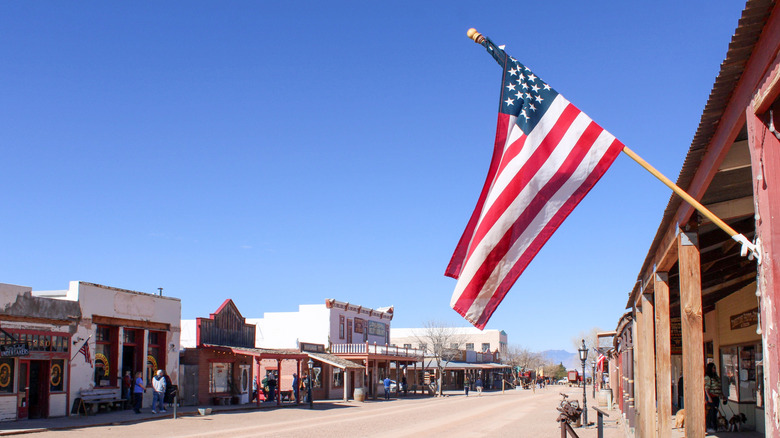 American flag flying over street in Tombstone, Arizona