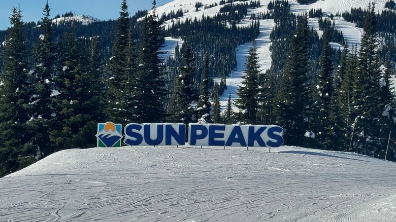 Sun Peaks sign on a ski hill in British Columbia, Canada