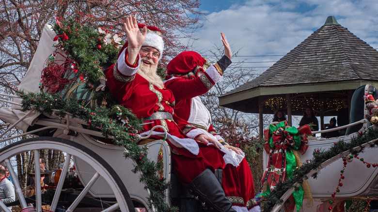 Santa and Mrs. Santa waving at parade in St. Charles Missouri