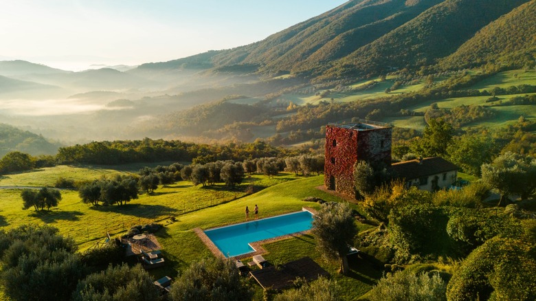 Aerial view of Villa Torre farmhouse and pool