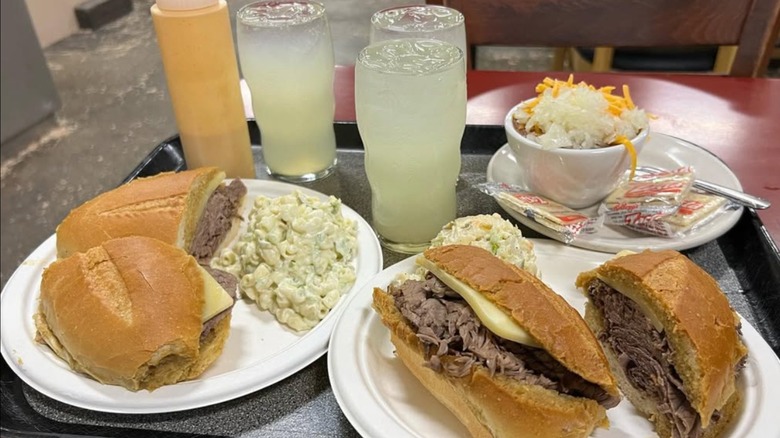 "French dipped" roast beef sandwiches and sides at Philippe the Original in Los Angeles, CA