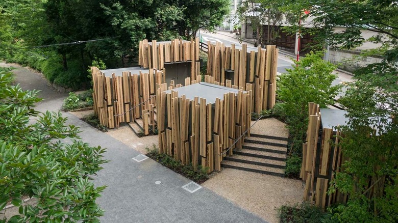 Image of a public toilet, called "A Walk through the Woods", designed by Kengo Kuma for the Tokyo Toilet project and located in Nabeshima Shoto Park, Shibuya district, in Tokyo, Japan