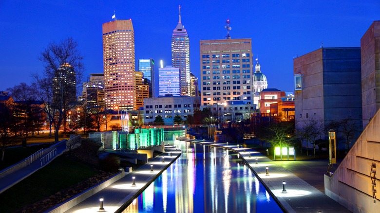 Colorful buildings lit up at night in Indianapolis