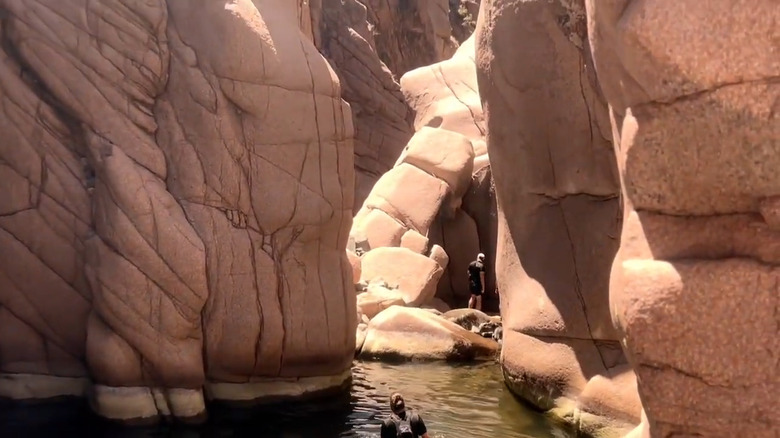 Two hikers in Salome Wilderness canyon