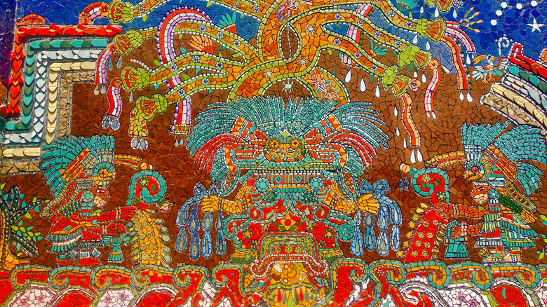 Colorful mosaic mural with orange and red tones in Zacatlán de las Manzanas