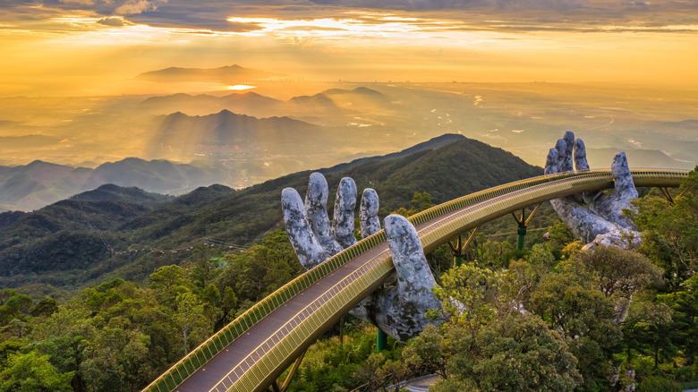 Golden Bridge at sunset overlooking rolling hills