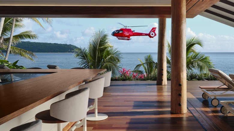 A chartered helicopter arrives at Pelorus Private Island in Queensland, Australia, during the day