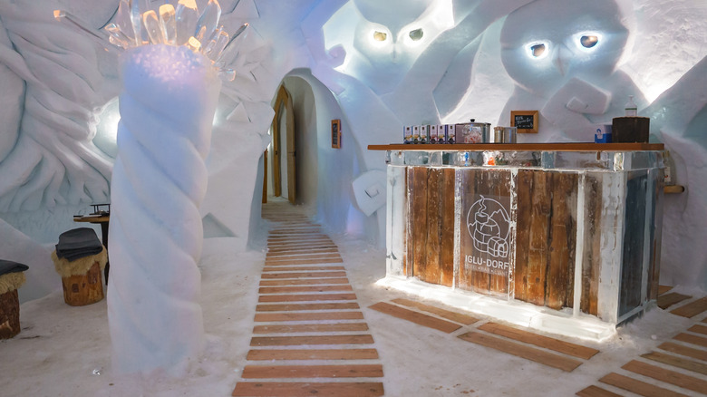 The restaurant at Iglu-Dorf with a wooden walking path