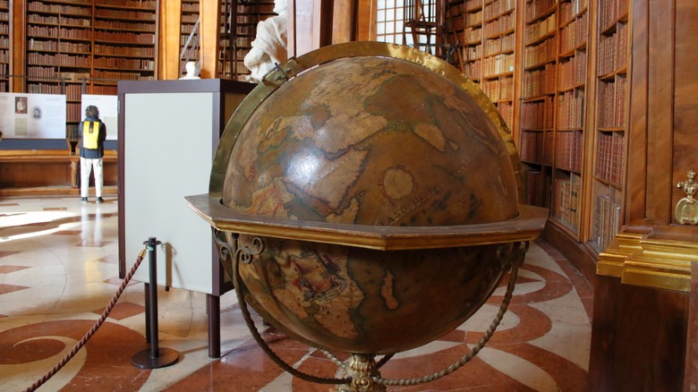 Globe and bookshelves at Austrian National Library