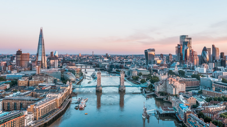 View of Tower bridge and nearby buildings at sunrise