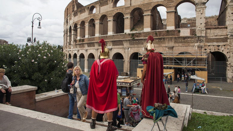 Costumed gladiators by Rome's Colosseum