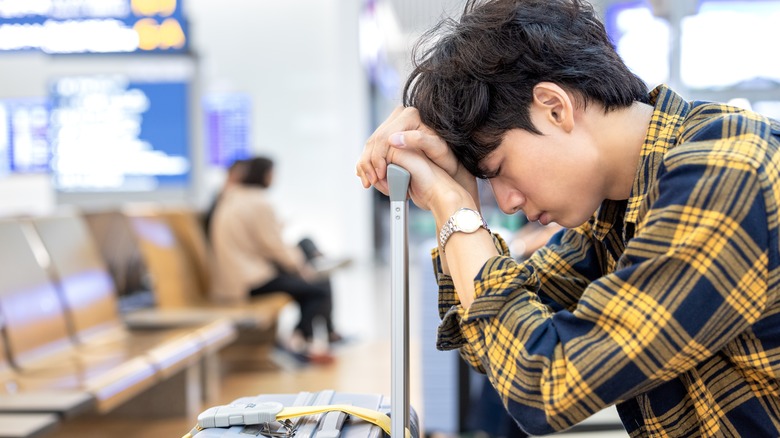 Upset man at airport