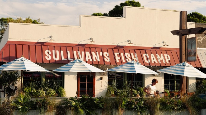 Fish restaurant exterior with umbrellas