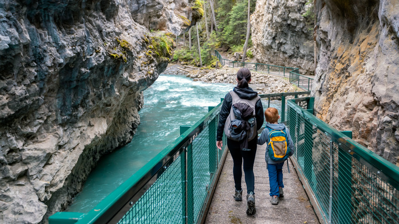 mother and son boardwalk banff