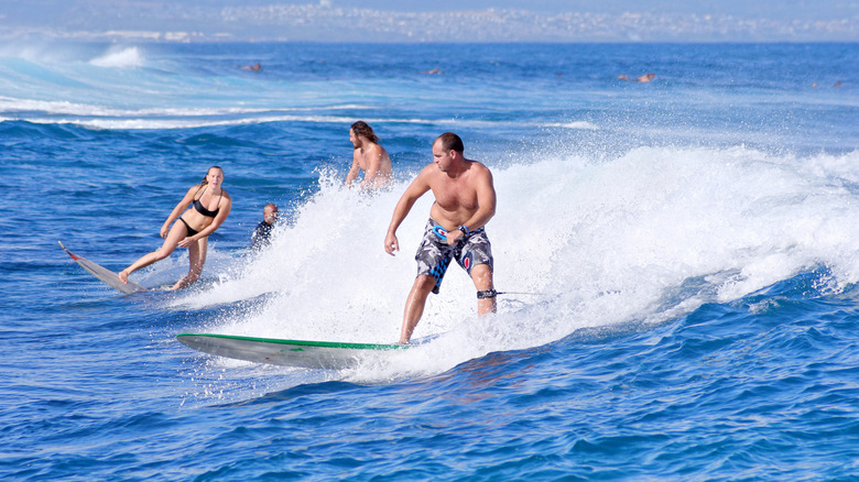 people surfing at Hookipa Beach