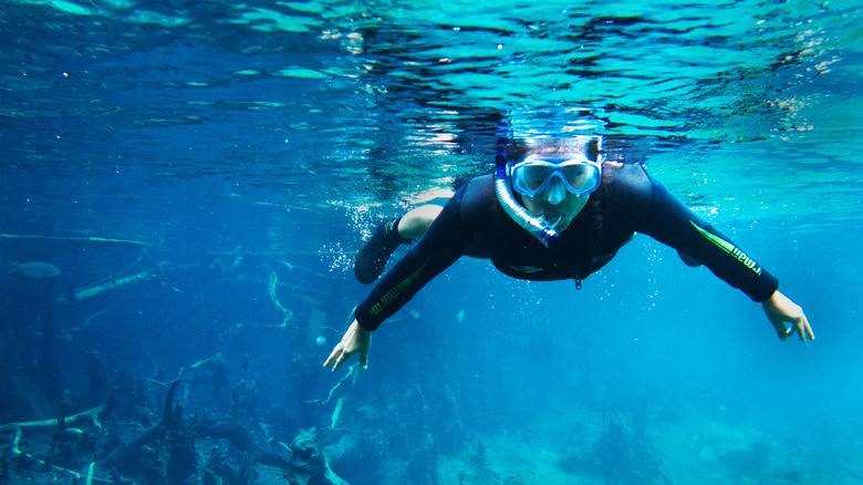 Girl snorkeling in Rio da Prata