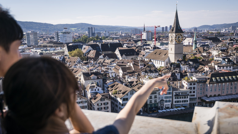 Tourists observing Zurich skyline