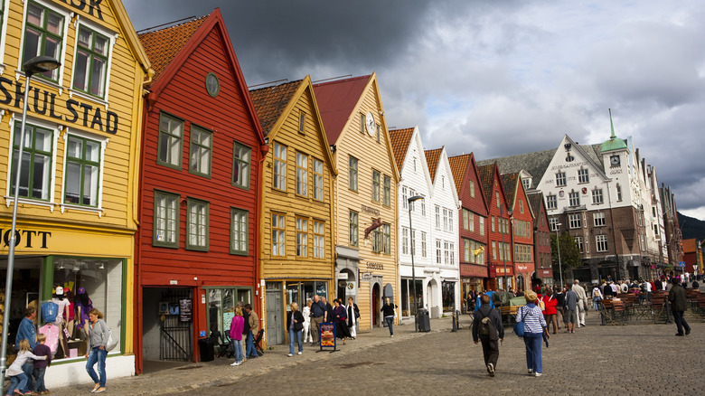 A row of shops in a Norwegian town on a cloudy day