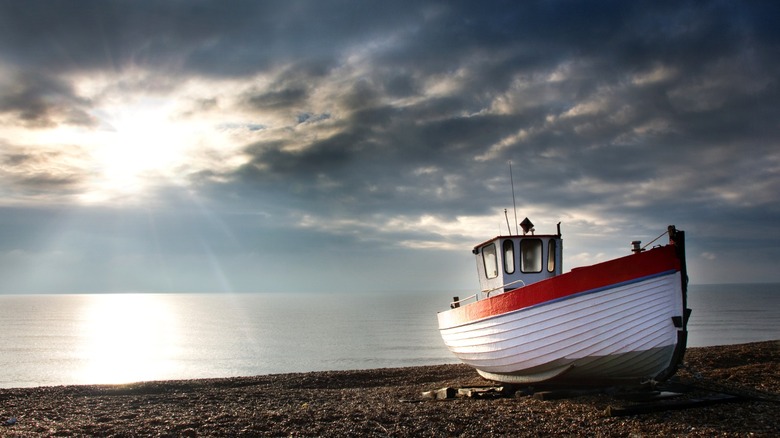 Lone fishing boat on Dungeness beach