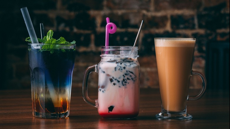 cocktail milky boba tea and coffee on a wooden table