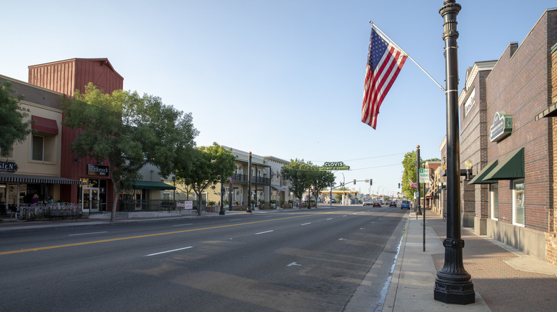 Small town Clovis with sign and flag