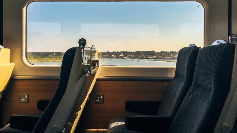 Empty train seats and window