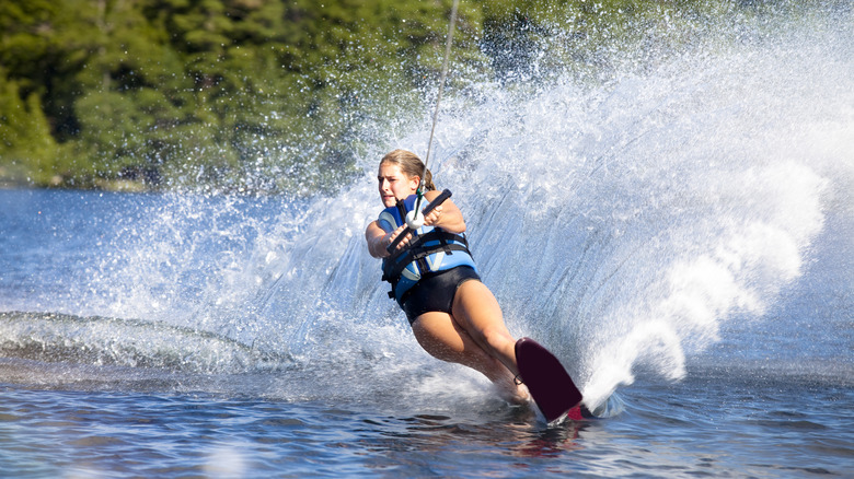 Woman on water skis on the lake