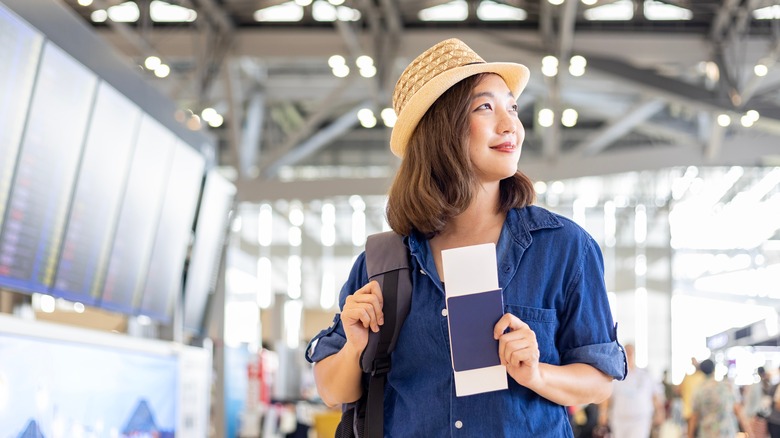 airline passenger carrying a passport