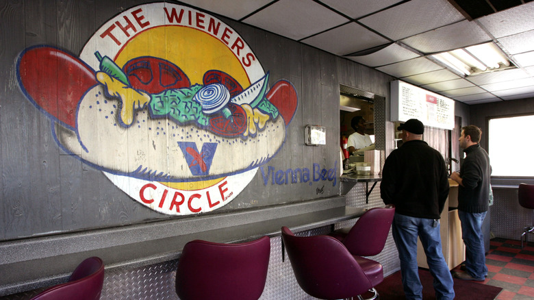 Customers ordering at The Wieners Circle, Chicago