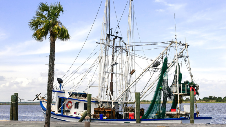 Shrimp boat tied to the pier in downtown Apalachicola, Florida