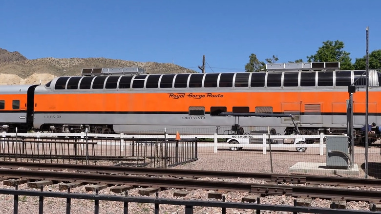 One of the orange and silver cars of the Royal Gorge Route train