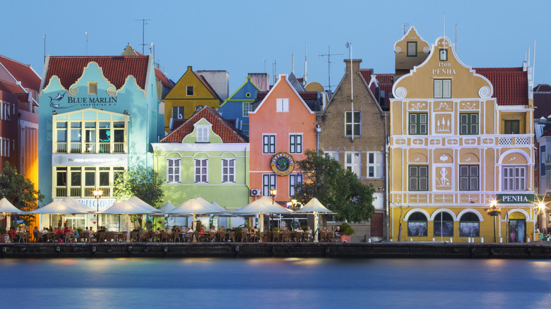 Colorful buildings of Willemstad on Curaçao's harbor at dusk