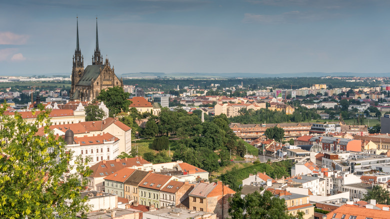 Brno skyline with modern houses and a church spire