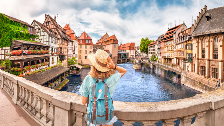 Tourist on bridge in Strasbourg