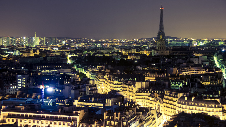 An aerial view of Paris and many of its streets at night