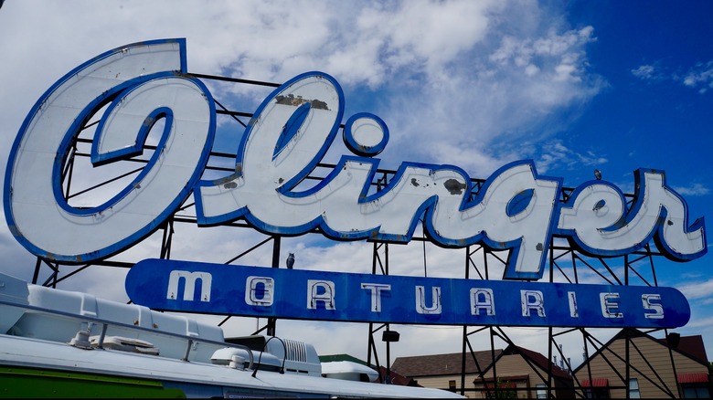 Olinger Mortuaries sign on the roof in Denver