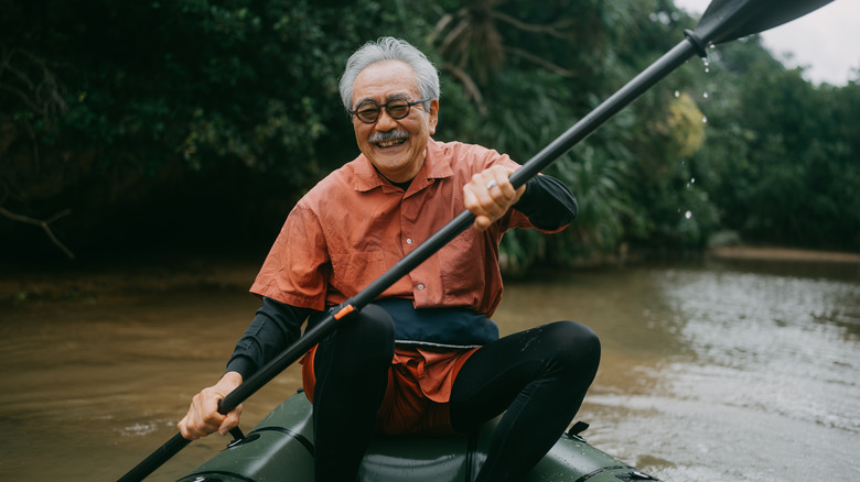 Okinawan man on kayak