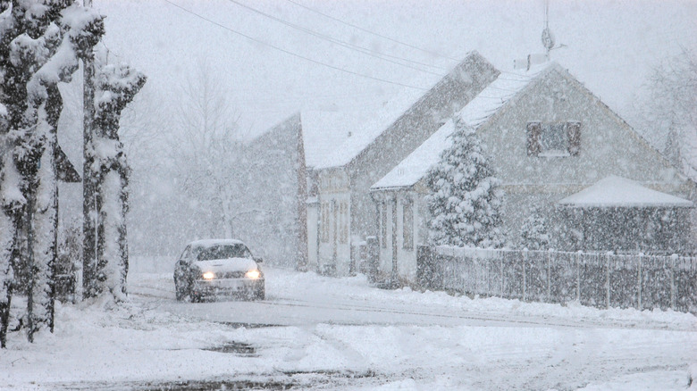 Car driving through a snowstorm