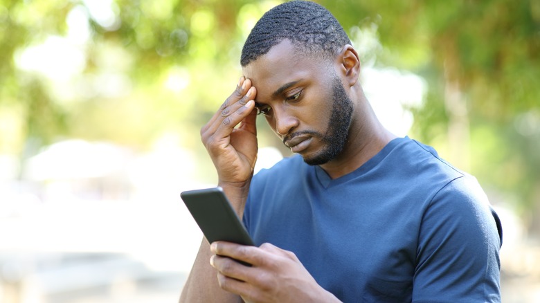 Man stressed about his phone