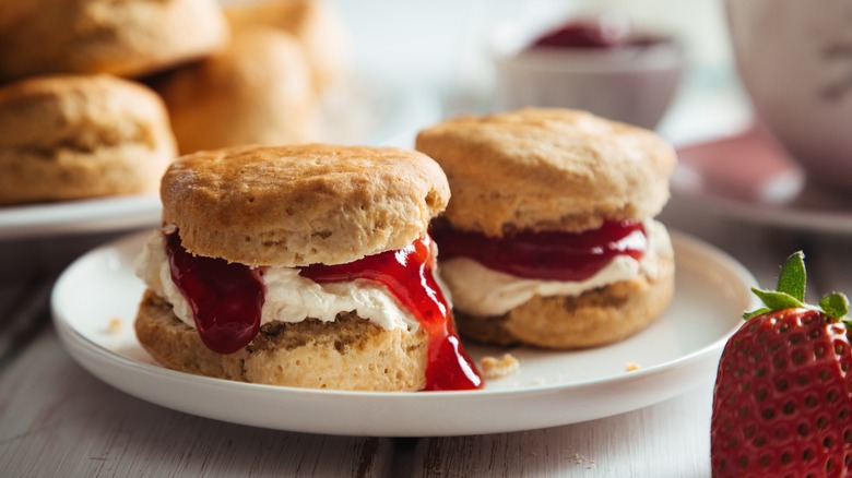 Is it clotted cream or jam first in an English scone?