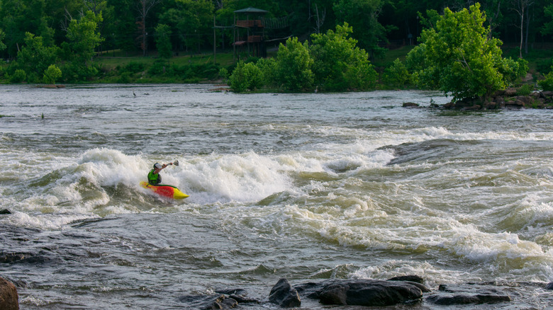 A person water rafting in the Chattahoochee River