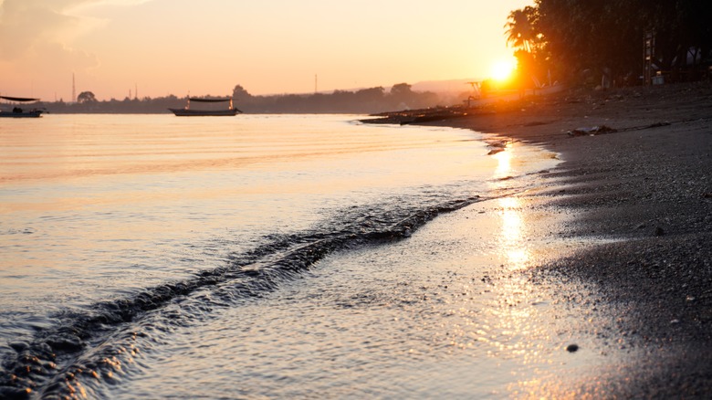 Black-sand Lovina Beach sunrise