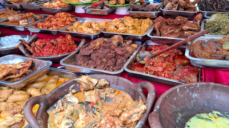 Trays of Indonesian curried meats