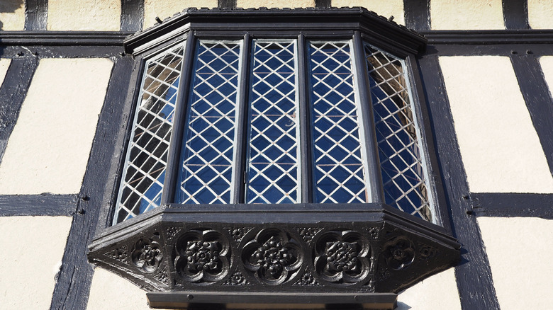 A close-up view of a window at Agecroft Hall