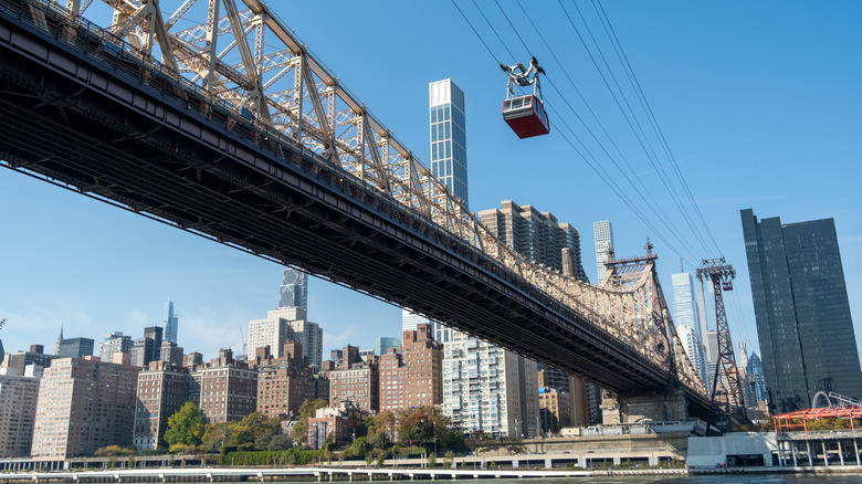 The Roosevelt Island tramway next to Queensboro Bridge