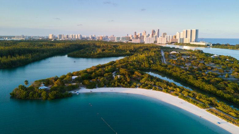 Aerial view of Oleta River State Park with Miami skyline in background